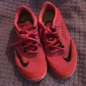 Hot pink nike shoes